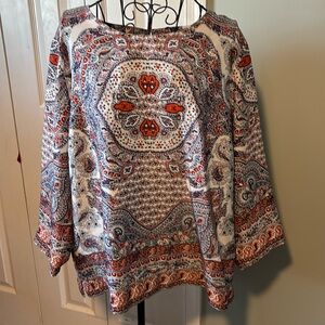 Silky Phil polyester wide sleeve multi patterned blouse.